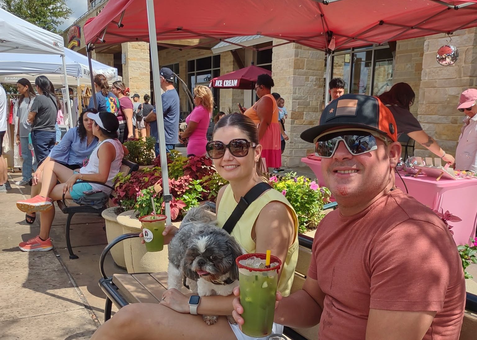 Guests shopping local vendors at the Farmer's Market at The Boardwalk Towne Lake in Cypress, Texas.