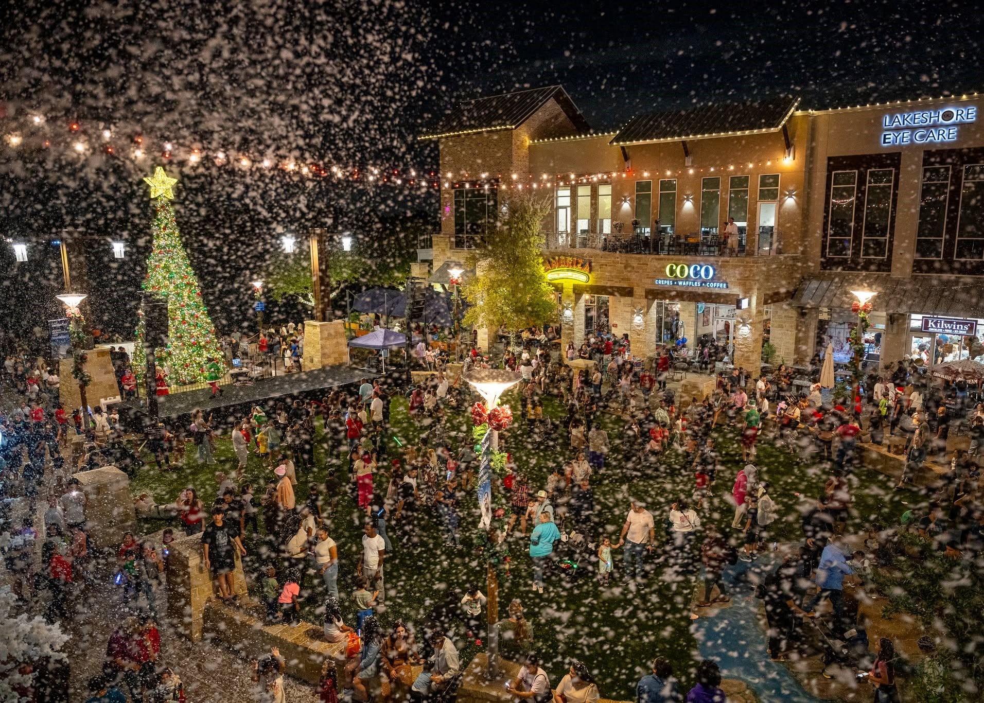 Holiday lights and festive activities during Light the Towne at The Boardwalk Towne Lake.